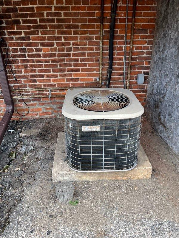 Responded to no cooling complaint at commercial facility with indoor temperatures exceeding 80 degrees. Upon arrival, discovered both A/C units were non-operational following a Friday power outage. Located tripped breakers inside building for both systems. 

Inspected newer Lennox unit and found condenser coils severely restricted with debris, causing unit to run hot and trip on thermal overload. Performed complete system cleaning and tune-up, including coil cleaning and operational check. Unit restored to proper operation with normal temperature differential.

Evaluated older unit which repeatedly tripped breaker during testing. Diagnosed compressor drawing excessive starting amperage, indicating internal wear and impending failure. Compressor showing signs of age-related deterioration affecting motor windings. Discussed repair options including hard start capacitor installation as temporary measure, but advised this would only provide short-term relief. Recommended obtaining estimate