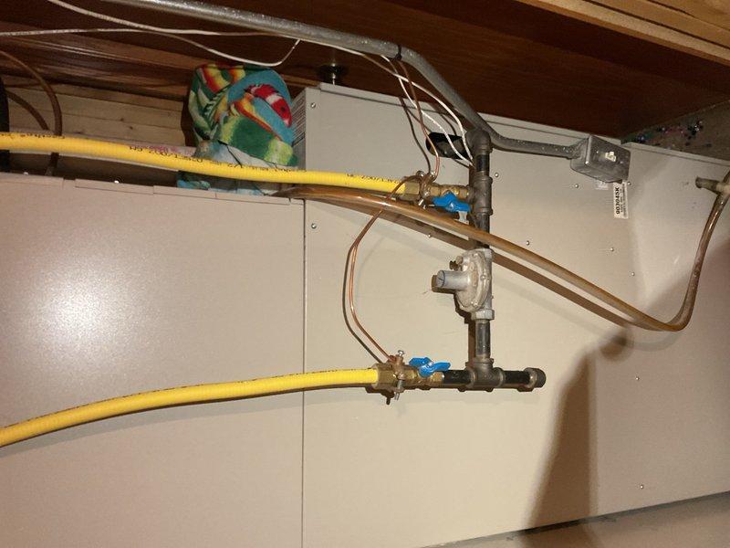 Responded to no cool call on 22-year-old system with frozen evaporator coil and suction line frozen back to compressor. Diagnosed significant refrigerant leak with system pressure at 80 psi versus expected 180 psi at equalization. Recommended system replacement due to age and extent of repairs needed, with sales advisor scheduled to provide equipment quote.
