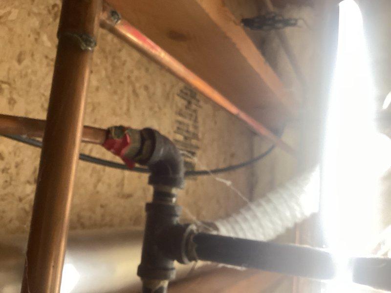 Responded to gas leak emergency at property where utility company had already shut off gas supply and locked out the meter. Utility personnel had identified and marked three separate gas leaks at threaded pipe joints in the system. Conducted thorough inspection of the affected areas to assess the extent of the leaks and determine repair requirements. Documented all three leak locations with photographs for record-keeping and estimate purposes. The leaking joints required disassembly, cleaning, re-threading, application of appropriate thread sealant, and reassembly to restore system integrity. Provided detailed estimate for complete repair of all three gas leaks, including approximately two hours of labor to properly address each connection point and ensure all joints meet code requirements for safe gas service restoration. Work cannot proceed until customer approval and will require coordination with utility company for gas service restoration and pressure testing upon completion of re