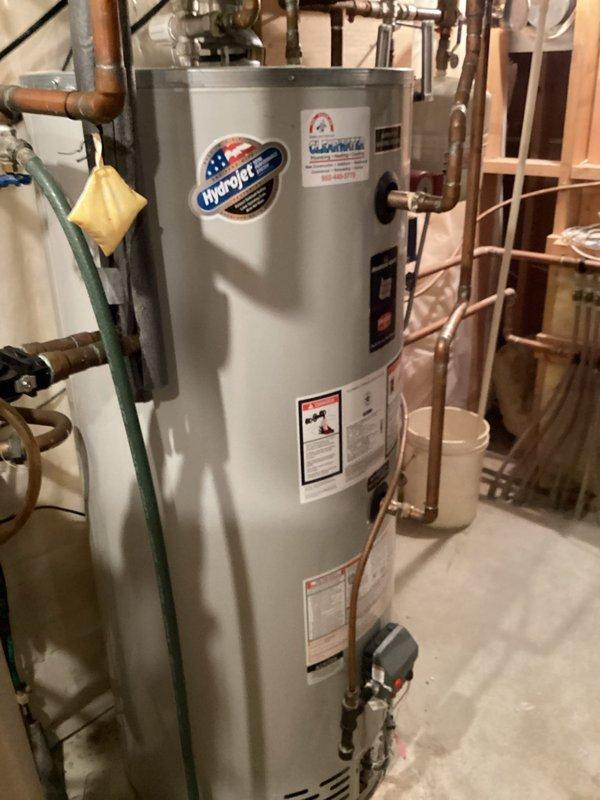 Responded to warranty follow-up for system low on refrigerant. Customer approved addition of R-410A refrigerant and UV leak detection dye, understanding that refrigerant and dye materials are not covered under parts warranty. Added refrigerant to proper charge levels and injected UV dye into system for future leak detection and diagnosis.