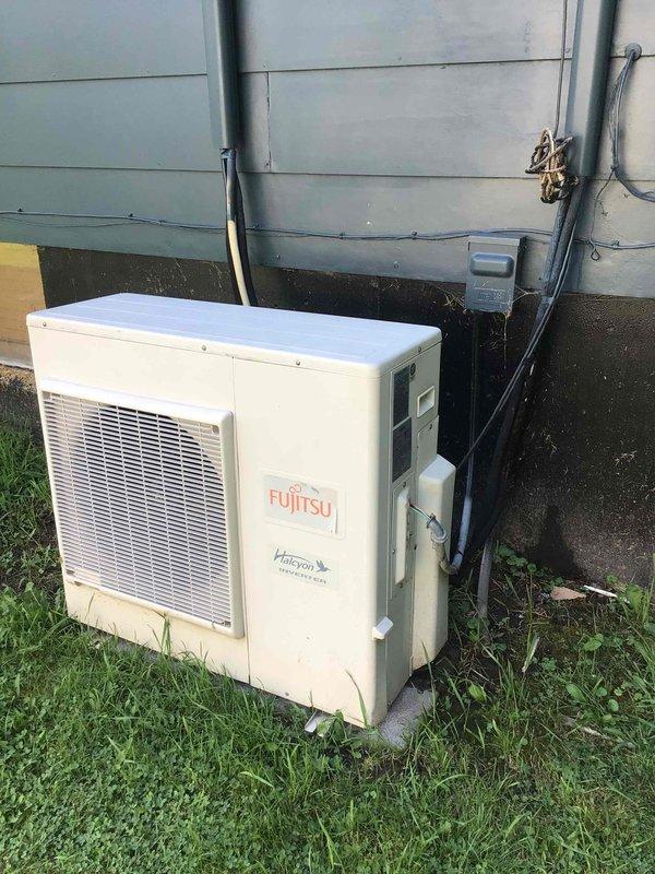 Responded to no cooling complaint on 16-year-old Fujitsu mini-split system. Upon inspection, found frozen refrigerant lines and confirmed unit had required R-410A refrigerant charge in 2021, indicating previous leak history. Customer disclosed physical impact damage to outdoor unit from golf cart collision. Given the age of the system, extent of damage, and history of refrigerant loss, advised customer that repairs would not be cost-effective. Provided replacement options and scheduled comfort advisor appointment for system replacement consultation.