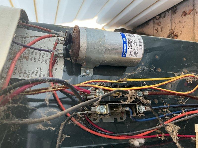 Responded to no cooling complaint with outdoor unit condenser fan failing to start, causing compressor to overheat and shut down after 1-2 minutes of operation. Upon inspection, found failed dual-run capacitor in severely deteriorated condition, visibly bulging and at risk of rupture. Replaced defective capacitor with new unit and restored proper fan motor operation. Performed complete system tune-up including coil cleaning, electrical connection inspection, contactor evaluation, and refrigerant charge verification. All wiring connections, contactors, and refrigerant levels found within normal operating parameters. Advised homeowner to replace dirty air filter. System tested and confirmed operating properly with normal cooling function restored.