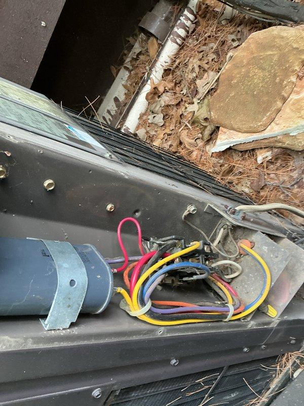 Completed comprehensive AC tuneup on residential system. Upon arrival, customer reported squeaking sound from AC lines in basement during operation. Performed full system diagnostics and testing, including capacitor testing which revealed out-of-specification readings. Contactor showed pitting but remained functional. Presented findings and recommended replacement of capacitor and contactor to prevent future system failure. Customer declined both repairs at this time. Documented equipment condition with photos showing outdoor unit components, wiring configuration, and electrical measurements. System remains operational but with noted component degradation that may require attention in the near future.