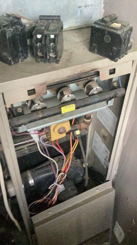 Responded to water heater leak on hot side outlet piping with multiple fitting failures. Replaced all hot and cold side piping and fittings above the water heater unit to eliminate leaks. Restored main water shut-off valve to operational position upon completion of repairs.