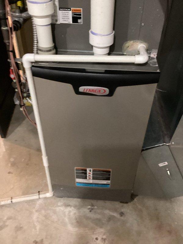 Completed annual AC tune-up maintenance per service agreement. Technician inspected outdoor condensing unit and indoor Lennox furnace system, verified proper operation of all components, and documented existing condensation issue reported by customer from ceiling area. All routine maintenance tasks performed with no additional repairs required at this time.