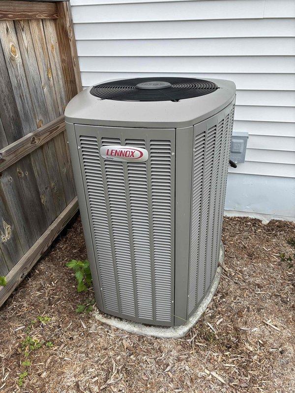 Performed complimentary AC inspection on Lennox system following reported delay in cooling mode activation three months prior. Customer had resolved issue by power cycling at furnace, with system operating normally since. Conducted comprehensive diagnostic evaluation including capacitor testing, contactor inspection, and condenser coil examination. Verified air filter condition, confirmed condensate drain line clear and flowing properly. All electrical components tested within normal operating parameters. System currently cycling properly and providing adequate cooling with no deficiencies identified.