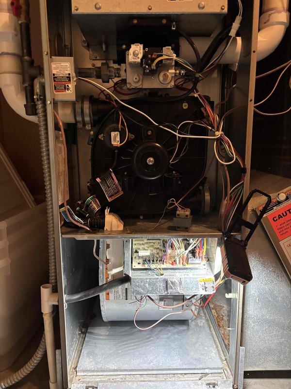 Completed comprehensive preventative maintenance on Bryant heating and cooling system under agreement terms. Performed full AC maintenance on one R22 condenser unit (model 2DSX3018G1000AA) including inspection of filter, thermostat, temperature split, condenser coils, motors, capacitors, compressor, refrigerant charge level, and condensate drain line. Conducted heating system tune-up with inspection of gas valve assembly, blower motor, control board, combustion chamber, and venting system. All components tested and found operating within normal parameters at 69-degree ambient temperature with proper airflow and refrigerant levels confirmed.