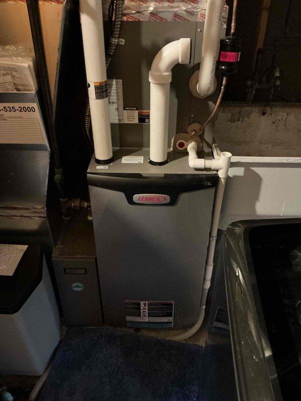 Responded to complaint of loud humming noise from furnace blower motor on 7-year-old Lennox HVAC system. Upon arrival, performed diagnostic inspection of furnace and blower assembly. System was operating normally with no loss of cooling function at time of service call. Attempted to duplicate reported noise condition but was unable to replicate the issue during the service window. Verified blower motor operation, checked electrical connections, and inspected belt and bearing assemblies for signs of wear or mechanical failure. All components appeared to be functioning within normal parameters during testing. Advised customer that intermittent noises can be difficult to diagnose without witnessing the condition firsthand. Recommended customer capture video and audio recording of the noise when it occurs to aid in future diagnosis. System left in operational condition with no immediate safety concerns identified.
