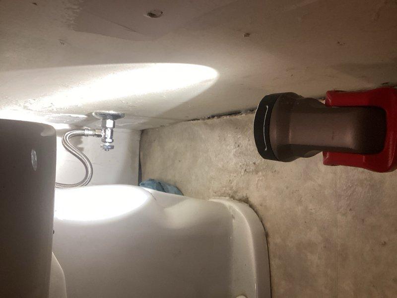 Responded to service call for basement toilet that was constantly running. Upon inspection, determined the fill valve was stuck in the open position due to age-related wear. Attempted to shut off water supply but found the existing angle stop valve would not close properly. Replaced the defective angle stop valve and installed new supply line to ensure proper water control and prevent future issues. Toilet now functioning correctly with no continuous running.