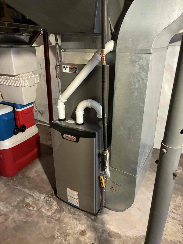 Completed comprehensive preventive maintenance on Lennox furnace and air conditioning system. Cleaned condenser coils, inspected all electrical components and connections, cleaned flame sensor and drain system, blew out pressure switch ports, and verified blower assembly cleanliness. Confirmed air filter in clean condition, drain line clear and flowing properly, temperature rise and temperature drop measurements within manufacturer specifications. All system components tested and operating correctly with no deficiencies noted.