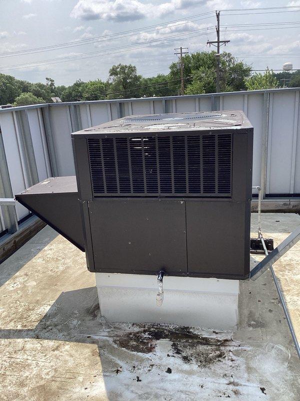 Completed overdue spring maintenance on commercial rooftop unit. Cleaned evaporator and condenser coils, replaced filters (18x18x2 and 18x20x2), and performed cooling operation check. System tested and verified operating properly with 22-degree temperature split across the coil.