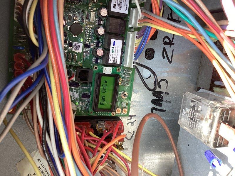 Responded to high humidity complaint at commercial salon facility. Upon inspection of multiple rooftop units, found all systems displaying return air humidity sensor errors and thermostat remote sensor disconnected faults. Determined remote sensors were not properly connected, causing system errors and inability to maintain proper humidity control. Photographed RTU1 exterior and control board for documentation. Scheduled return visit to access all units, replace sensor batteries, and reconnect all remote sensors to restore proper humidity monitoring and control functionality. Provided quote for additional sensor installation in room 106 to improve humidity management in that zone.