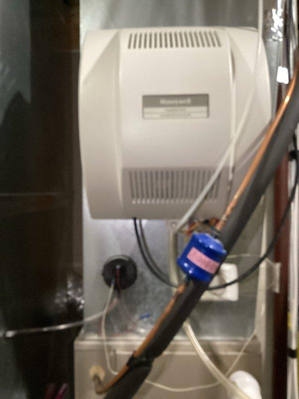 Completed comprehensive furnace and air conditioning tune-up on 14-year-old HVAC system. Performed standard maintenance procedures including inspection of furnace components, AC unit, Honeywell humidifier, and electrical panel with all circuit breakers confirmed operational. No issues identified during service; system operating within normal parameters.