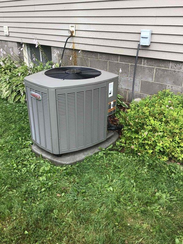 Completed comprehensive air conditioning tune-up and maintenance service on residential outdoor condensing unit. Performed thorough washing of outdoor unit cabinet and coils to remove debris and ensure optimal heat transfer efficiency. Conducted complete electrical system testing with all voltage and amperage readings measuring within manufacturer specifications. Replaced air filter and verified system performance with 20-degree temperature differential across evaporator coil, confirming proper refrigerant charge and airflow. Unit operating properly with no deficiencies noted.