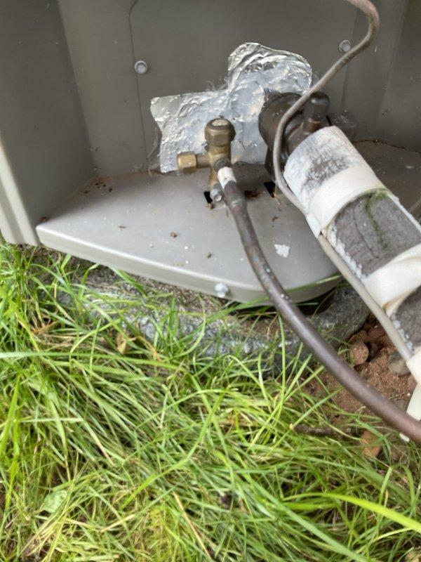 Responded to no cooling complaint on 7-year-old Lennox system. Upon inspection, discovered rodent damage to compressor wiring harness. Replaced damaged harness with compatible unit from inventory and restored electrical connections to compressor. Sealed penetrations around line set with silicone to prevent future rodent entry. Removed and discarded damaged compressor jacket. Cleared inverter alarm codes from system. Verified proper system operation and cooling restored to residence.