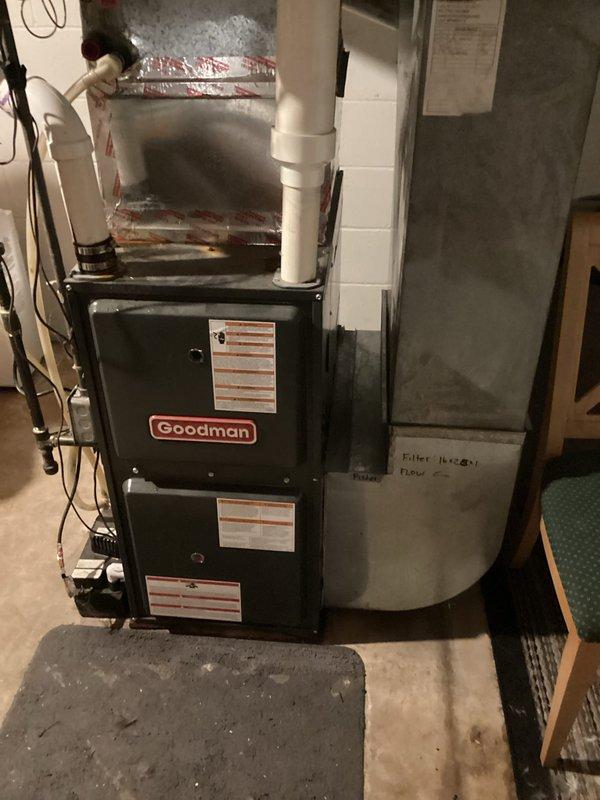 Responded to no cooling call on 20+ year old residential air conditioning system. Upon inspection, diagnosed unit as low on refrigerant charge. Due to age of equipment and refrigerant loss, provided estimate for complete system replacement rather than repair. Unit photographed for documentation purposes.