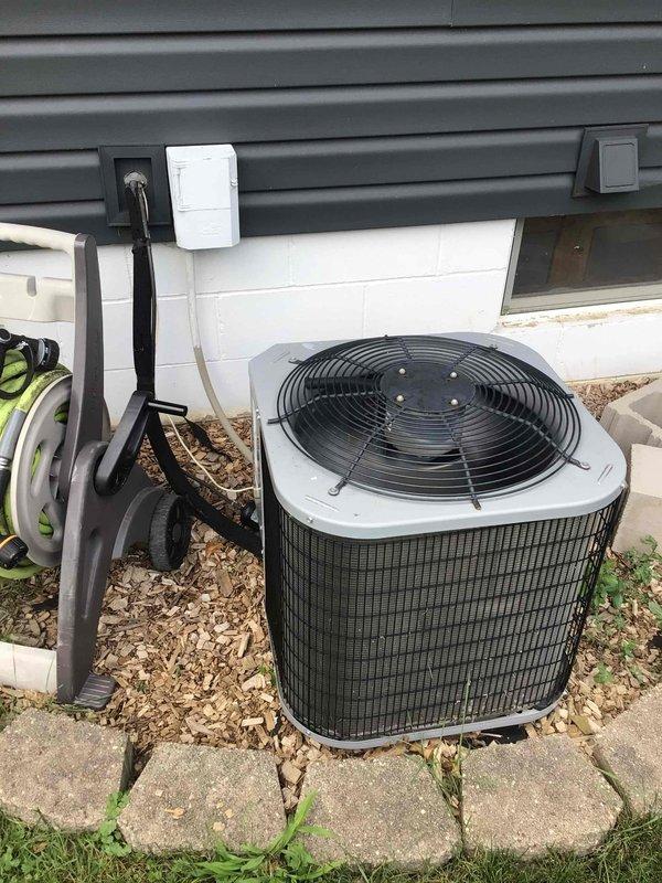 Responded to no cooling complaint on residential air conditioning system. Upon arrival, found 1.5 ton unit running continuously without achieving setpoint temperature. Performed diagnostic evaluation using manifold gauges to check system pressures and operation. Investigation revealed that the system has been operating continuously since occupancy began approximately nine years ago. Property has undergone significant renovations and additions, expanding the conditioned space to approximately 1900-2400 square feet. Assessment determined that the existing 1.5 ton capacity is severely undersized for the current square footage of the home, resulting in inability to adequately cool the space and continuous runtime. System is functioning mechanically but lacks sufficient capacity to meet the cooling load demands of the expanded living area. Recommended system replacement with properly sized equipment to match current home dimensions and cooling requirements.