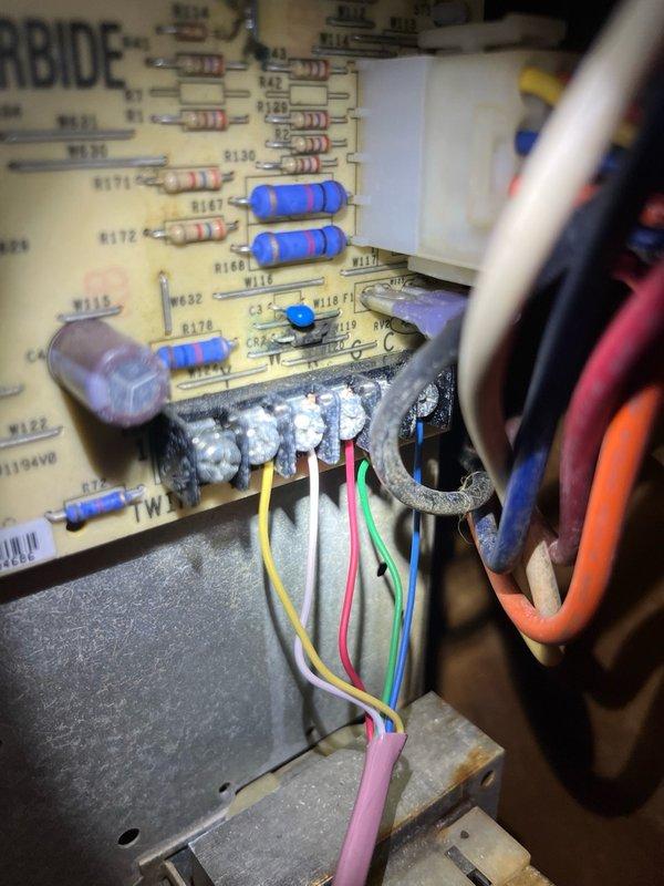 Responded to no-cool condition following new AC installation where blower motor would not engage. Verified thermostat was calling for fan operation, but furnace was unresponsive. Replaced capacitor initially with no improvement. Performed diagnostic testing and confirmed control board was receiving thermostat signal but failing to send power to blower motor during fan and cooling calls. Determined control board failure as root cause. Observed frozen evaporator coil with water leakage into cabinet, indicating restricted airflow from non-operational blower. Documented findings with photos of furnace interior, wiring harnesses, and failed control board assembly. Advised customer that control board replacement is required and system will need refrigerant charge once blower operation is restored.