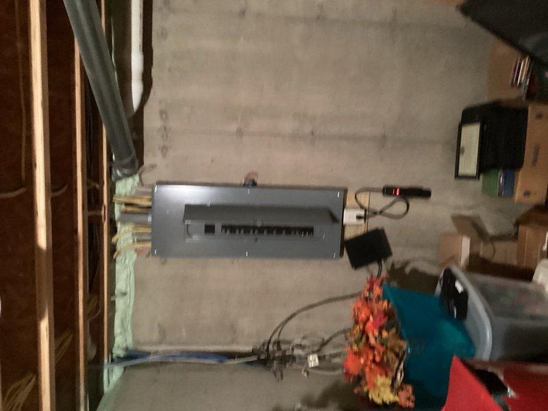Responded to complaint of loud banging pipes when upstairs sink was turned on at maximum flow and intermittent sputtering at first floor kitchen sink. Diagnosed water hammer condition caused by partially closed angle stop valve at bathroom faucet. Opened angle stop valve fully to restore proper water flow and eliminate hydraulic shock in the supply lines. Issue resolved upon testing.