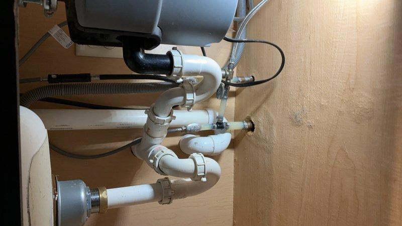 Responded to a slow-draining kitchen sink complaint and successfully cleared a clog located approximately 40 to 50 feet into the drain line using an auger. Additionally cleaned the kitchen sink drain using a 1.5 to 3-inch bladder to ensure proper flow and prevent future blockages.