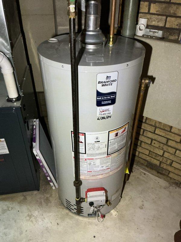 Completed comprehensive plumbing inspection for newly purchased residence with no reported issues at time of scheduling. Inspected water heater installation, including Bradford White unit with proper venting, gas connections, pressure relief valve, and combustion air intake configuration. Evaluated all visible plumbing infrastructure, supply lines, drainage systems, and utility connections throughout mechanical room and basement areas. Identified partially obstructed drain line serving laundry area during inspection. Documented equipment conditions and plumbing system components with photographic records. Provided estimate for drain cleaning service to address the slow-draining laundry fixture.