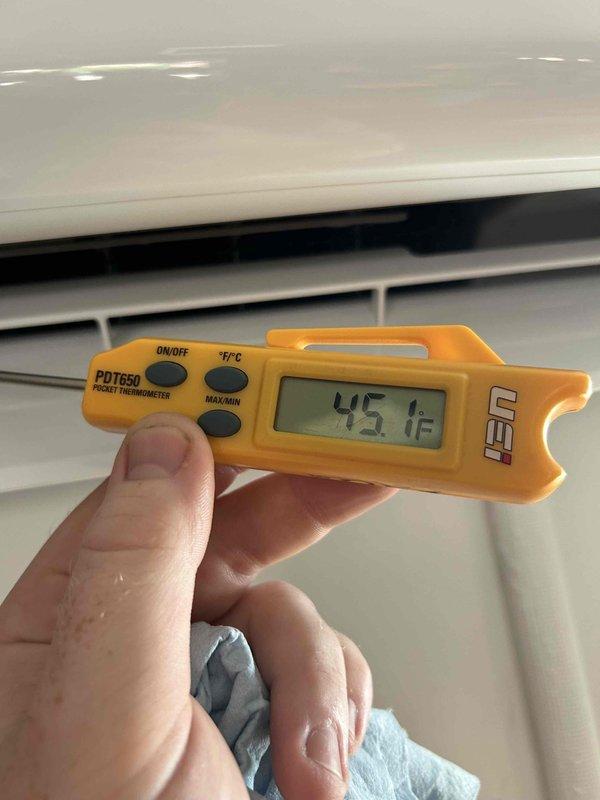Performed comprehensive cleaning service on ductless mini-split system. Disassembled and thoroughly cleaned blower wheel using specialized mini-split cleaning kit and coil jet cleaner with sprayer. Verified system operation with discharge air temperature reading of 45°F upon completion.