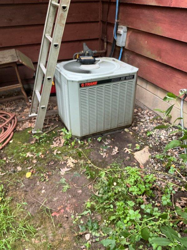 Responded to first call for minimal airflow from vents on 30-year-old furnace system. Upon inspection, discovered frozen evaporator coil caused by low R22 refrigerant charge in air conditioning system. Scheduled comfort advisor meeting to discuss system replacement options due to age of equipment and obsolete refrigerant type.