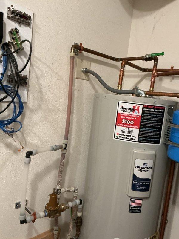 Diagnosed excessive water pressure of 115 psi entering the building from the municipal supply, which posed a risk to plumbing fixtures and appliances. Installed a pressure reducing valve (PRV) on the main water service line to regulate incoming pressure down to a safe operating level of 60 psi. Replaced the main water service valve with new brass components up to 2" to address a leaking or failed valve condition, ensuring proper shutoff capability and system integrity.