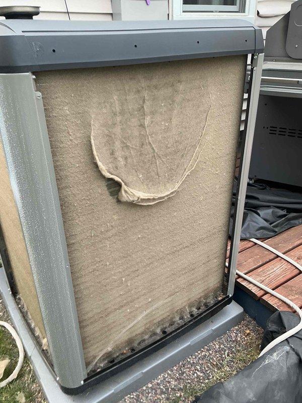 Performed preventive maintenance agreement tune-up on 1-year-old Lennox air conditioning system. Inspected contactor and inverter board, both operating within normal parameters. Verified refrigerant charge at proper levels. Removed access panels and pressure-washed outdoor condenser coil to remove debris and improve heat transfer efficiency. Replaced heavily soiled furnace filter with new filter. Inspected evaporator coil, found clean with no buildup. Measured supply and return air temperatures, confirmed system achieving 20-degree temperature differential, which is within manufacturer specifications. All components functioning as designed with no deficiencies noted or recommendations required at this time.