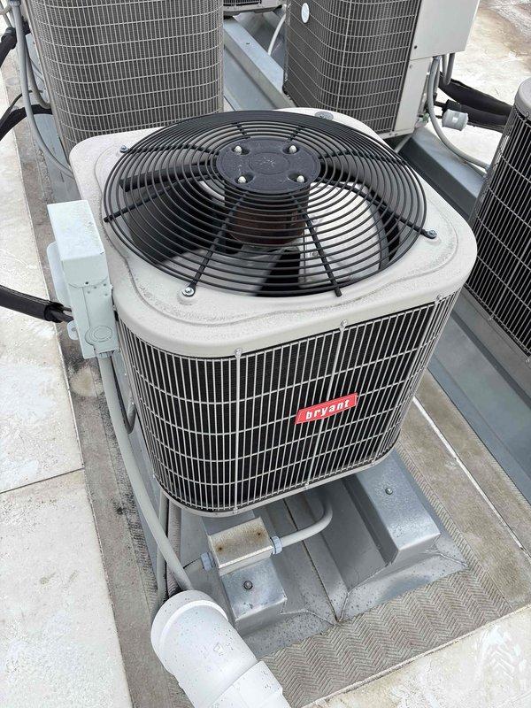 Completed annual AC maintenance on one Bryant condenser unit utilizing R-410A refrigerant with ambient temperature at 67 degrees. Performed comprehensive system inspection including air filter, thermostat operation, temperature split across evaporator coil, condenser unit, evaporator and condenser coils, blower motor, condenser fan motor, capacitors, compressor operation, and refrigerant charge level. Identified low refrigerant charge during inspection; however, system maintained adequate cooling performance at time of service. Presented repair estimate for refrigerant recharge, which was declined by homeowner. All other system components including motors, capacitors, and electrical connections operating within normal parameters. System currently functioning properly despite reduced refrigerant level.