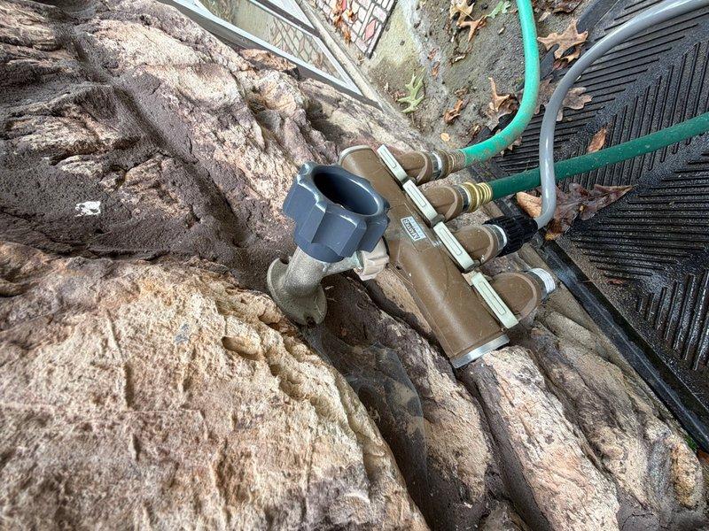 Replaced standard hose bibb stem on outdoor water supply system. During inspection, discovered pressure switch stem heavily packed with sediment causing pressure issues. Installed new hose bibb stem and replaced pressure switch to restore proper water flow and pressure control to the outdoor manifold assembly.