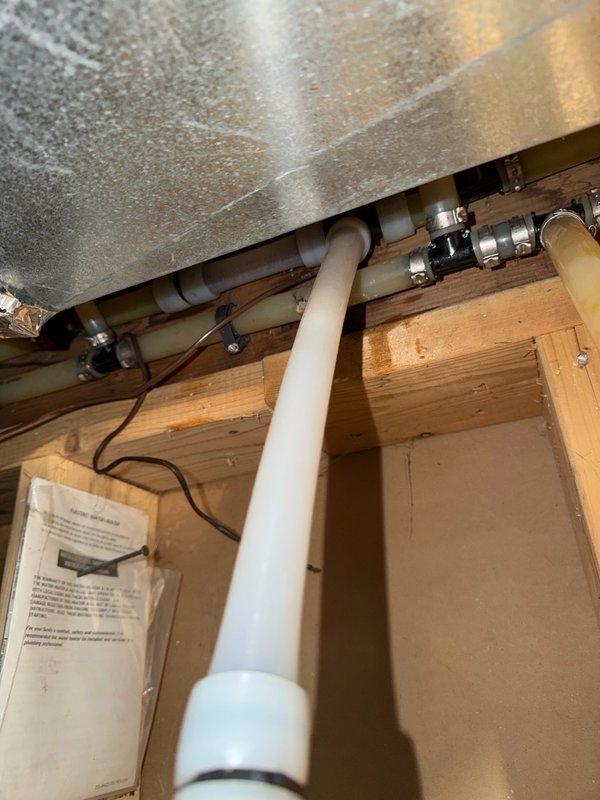 Responded to water leak in mechanical room where a crimp tee fitting on PVC piping had failed and was actively leaking. Isolated the affected section, removed the defective crimp tee connection, and replaced the damaged pipe section with new PVC piping and proper fittings. Tested the repaired system to confirm leak was eliminated and all connections were secure.