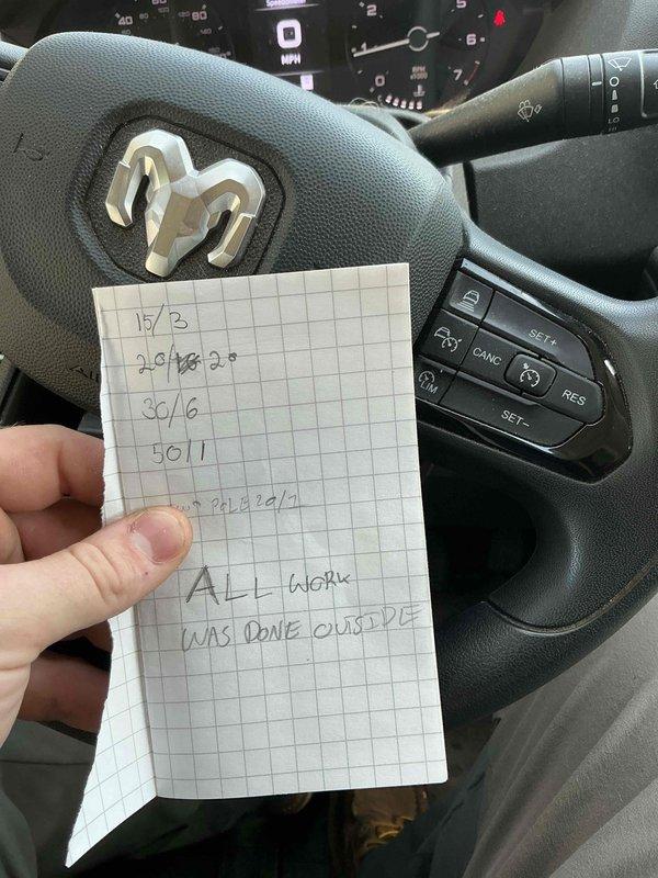 Completed phone follow-up regarding invoice inquiries. Documented vehicle interior condition with photographic evidence showing handwritten notes on graph paper detailing service dates and confirmation that all work was performed at an outside facility. Notes indicated multiple service intervals and reference numbers for tracking purposes.