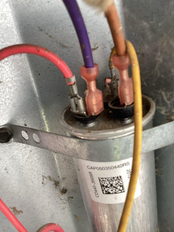 Completed comprehensive AC tune-up on 8-year-old Goodman GSX130241DA system that had been running continuously without maintenance for several years. Identified and addressed multiple critical issues including a failing capacitor, worn contactor, nearly blocked secondary drain line, and restricted evaporator coil. Performed thorough cleaning of evaporator coil to restore proper airflow, cleared secondary drain line blockage, and replaced failing capacitor and contactor to ensure reliable system operation and prevent potential failure during peak cooling season.
