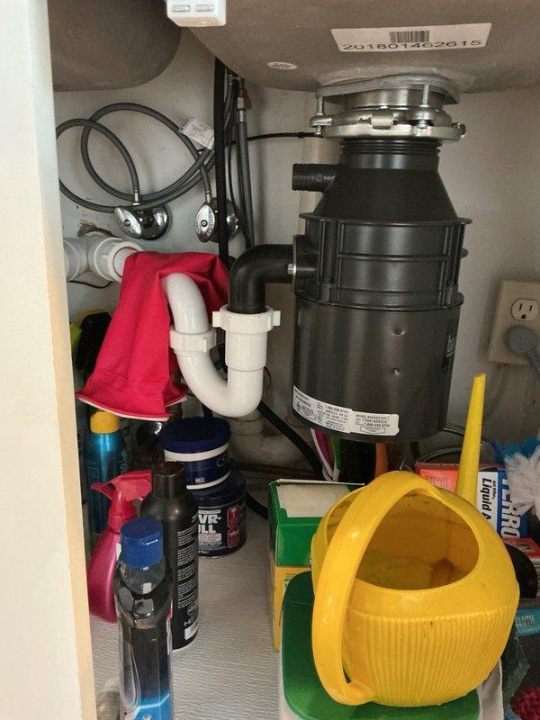 Responded to kitchen sink clog caused by vegetable matter accumulation in the drain line. Successfully cleared the blockage using plunging techniques, restoring proper drainage through the garbage disposal system. Additionally, replaced a worn toilet flapper to address secondary plumbing issue identified during the service visit.