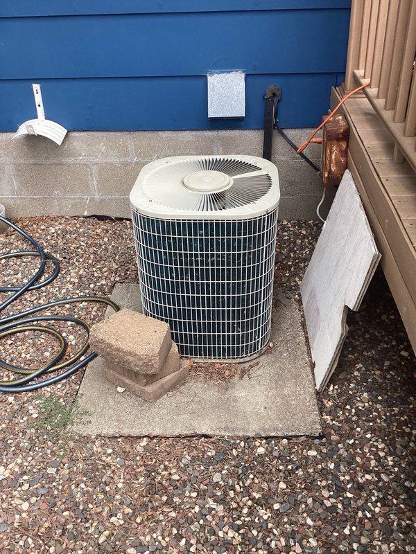 Responded to loss of cooling capacity complaint on residential R-22 air conditioning system. Previous service provider had replaced capacitor but did not address refrigerant charge. Performed system inspection and confirmed unit was low on R-22 refrigerant. Discussed with homeowner the implications of R-22 phase-out, limited availability, and increasing costs associated with maintaining older systems using this refrigerant. Recommended full system replacement as the most cost-effective long-term solution given the refrigerant type and system condition. Homeowner elected to obtain replacement estimate from previous service provider first due to existing discount offer, with option to request second quote if desired. No repairs performed at this time.
