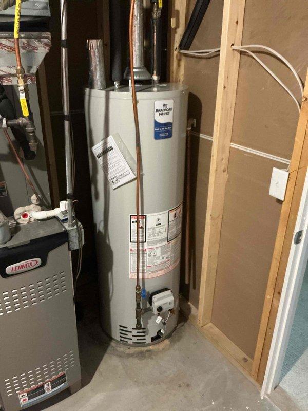 Responded to water pooling issue in mechanical room caused by unsecured water softener drainage line. Secured the softener drain line properly and replaced two defective clean out caps to ensure proper drainage flow. Water accumulation on floor has been resolved and drainage system is now functioning correctly.