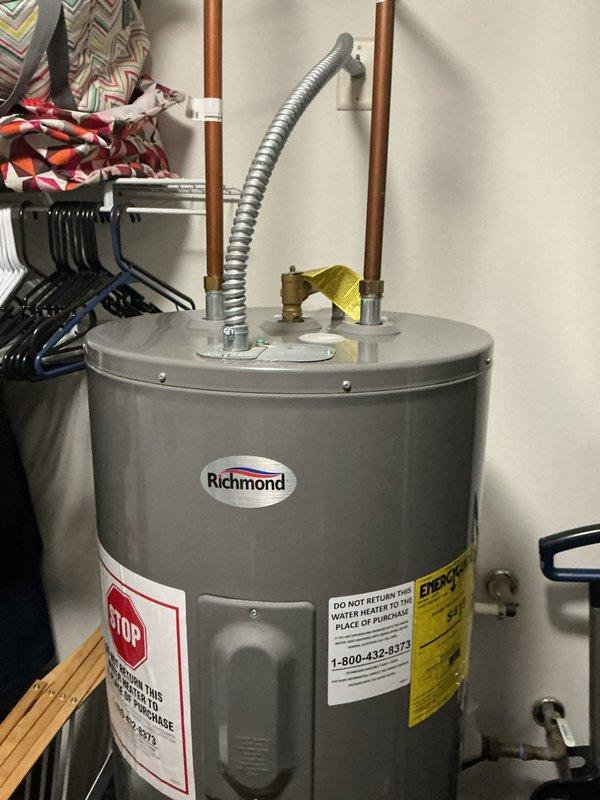 Performed AC tuneup and discovered system operating with only an 11-degree temperature split in cooling mode. Pressure readings indicated the unit was low on R410A refrigerant. Recharged the system with R410A refrigerant and added UV dye to aid in leak detection. Scheduled follow-up visit to locate and address potential refrigerant leak in the system.