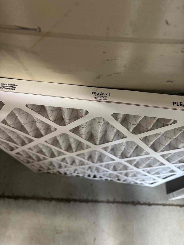 Delivered and installed 20x25x1 pleated air filter to complete previously scheduled maintenance work. Filter was carefully placed between front screen doors per customer instructions to protect from weather damage, as previous filters had been compromised by rain exposure. Installation verified and documented with photos.