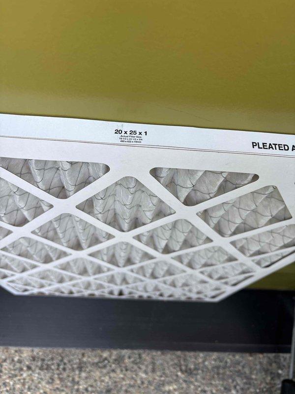 Delivered and installed 20x25x1 pleated air filter to complete previously scheduled maintenance work. Filter was carefully placed between front screen doors per customer instructions to protect from weather damage, as previous filters had been compromised by rain exposure. Installation verified and documented with photos.