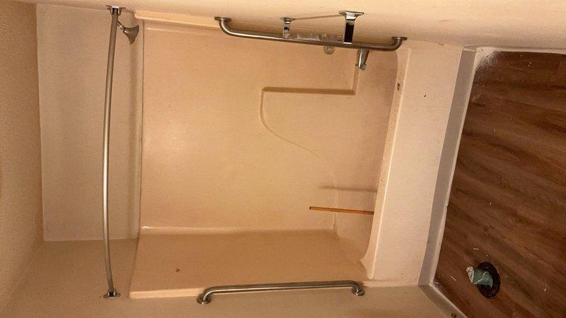 Successfully supplied and installed two 36-inch chrome grab bars in the tub/shower area for enhanced safety and accessibility. Installation locations were confirmed with the customer prior to mounting to ensure optimal placement and functionality, with one bar positioned horizontally on the shower wall and another installed near the bathtub area.