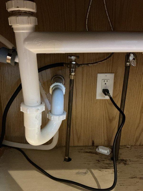 Responded to water leak under kitchen sink. Upon inspection, discovered multiple leaks at dishwasher connection points resulting from improper DIY installation. Identified leaks at angle stop valve, supply lines, and connection fittings. Repaired all compromised connections, tightened fittings to proper torque specifications, and verified system integrity. All leaks resolved and plumbing restored to proper working condition.
