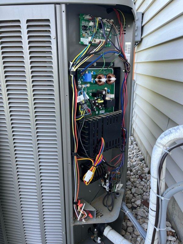 Completed comprehensive AC tune-up on residential split system with all components found operating within manufacturer specifications. Replaced air filter, cleaned outdoor condenser coil, inspected electrical connections and circuit boards, verified capacitor operation, and tested system performance through full 15-minute run cycle with no issues observed.
