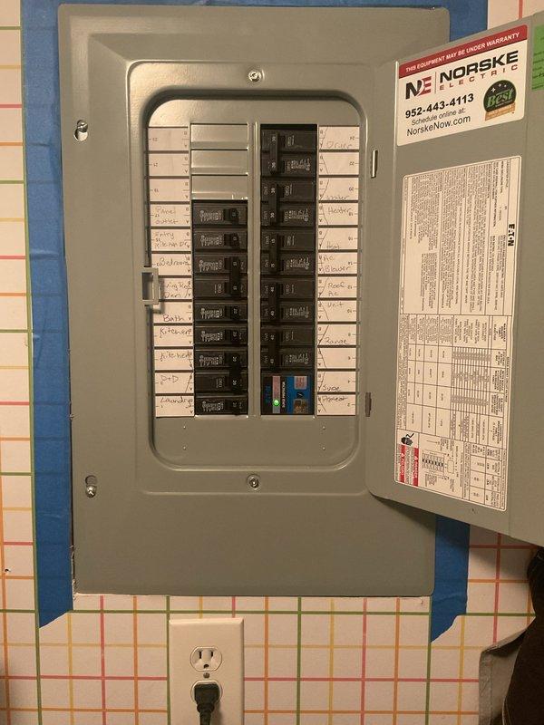 Completed annual AC tune-up on rooftop unit, accessing roof with key obtained from front desk. During inspection, discovered hermetic compressor capacitor reading out of specification and replaced with new capacitor. Installed 20x16x1 air filter to complete maintenance service.