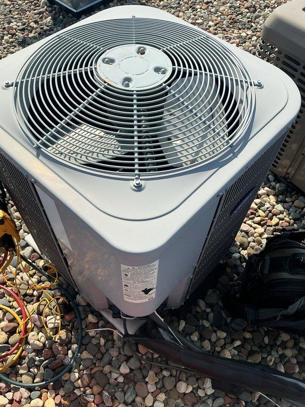 Performed comprehensive AC tune-up on 11-year-old air conditioning system. Verified refrigerant levels within proper range and confirmed all components operating within manufacturer specifications. Conducted electrical diagnostics using digital multimeter, identifying capacitor reading at lower end of acceptable range. Replaced capacitor as preventative maintenance measure to ensure continued reliable operation. System tested and confirmed fully operational upon completion.