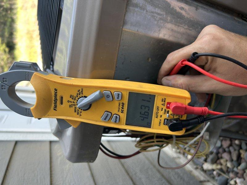 Completed comprehensive membership air conditioning maintenance and tune-up on multi-zone HVAC system. Tested and verified proper operation of air conditioner and all three zone dampers. Inspected air filter and condensate drain, both found clean and functioning properly. Performed outdoor condenser unit cleaning and thorough inspection of electrical components, measuring 3.31 amps draw. Connected manifold gauges to verify refrigerant pressures and temperatures, confirming all system parameters within manufacturer specifications and optimal operating condition.