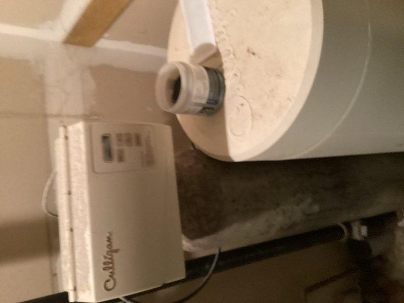 Removed existing water softener system from residential plumbing installation. Capped water softener return line and repiped the water supply system to bypass the removed softener unit, restoring direct water flow to household fixtures. All connections were properly secured and tested for leaks to ensure system integrity.