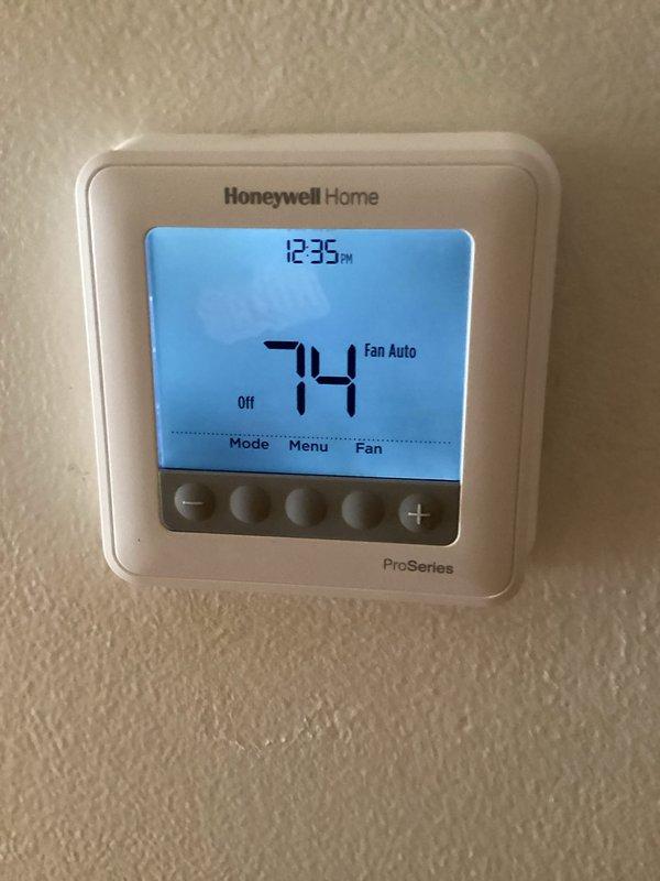Completed certified safety inspection on residential furnace and HVAC system for rental property compliance. Performed comprehensive evaluation of heating equipment, water heater, venting systems, and thermostat operation. Inspected flue pipe assembly, ductwork, and exhaust connections for proper installation and safety. Verified thermostat functionality showing proper display and control settings. Examined all mechanical components including gas lines, electrical connections, and safety controls. All systems passed inspection with no deficiencies noted. Certification letter generated and provided for rental licensing requirements.