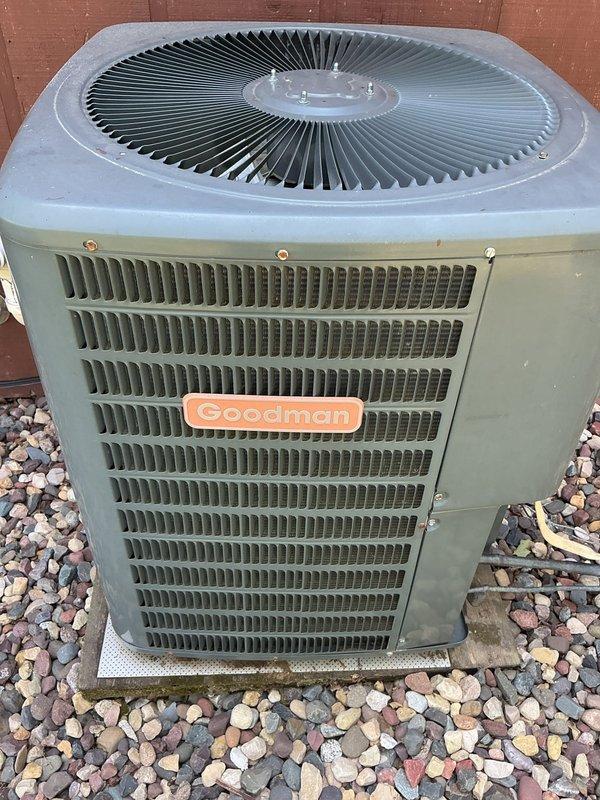 Responded to no cooling complaint on residential air conditioning system. Upon inspection, diagnosed low refrigerant charge on R22 system. Verified filter and evaporator coil condition were acceptable. Measured inadequate cooling output and confirmed refrigerant deficiency in outdoor Goodman condensing unit. Due to R22 phase-out and system age, scheduled comfort advisor appointment to provide system replacement estimate rather than recharging obsolete refrigerant.