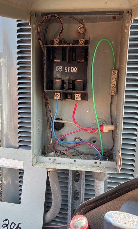 Completed inspection corrections on newly installed 1.5 ton, 14.5 SEER2 air conditioning system. Verified proper electrical connections at air handler low voltage terminal strip with color-coded wiring secured per manufacturer specifications, confirmed refrigerant line connections with proper insulation, and inspected outdoor disconnect box with contactor assembly showing proper wire terminations and grounding. All components tested and operational per code requirements.